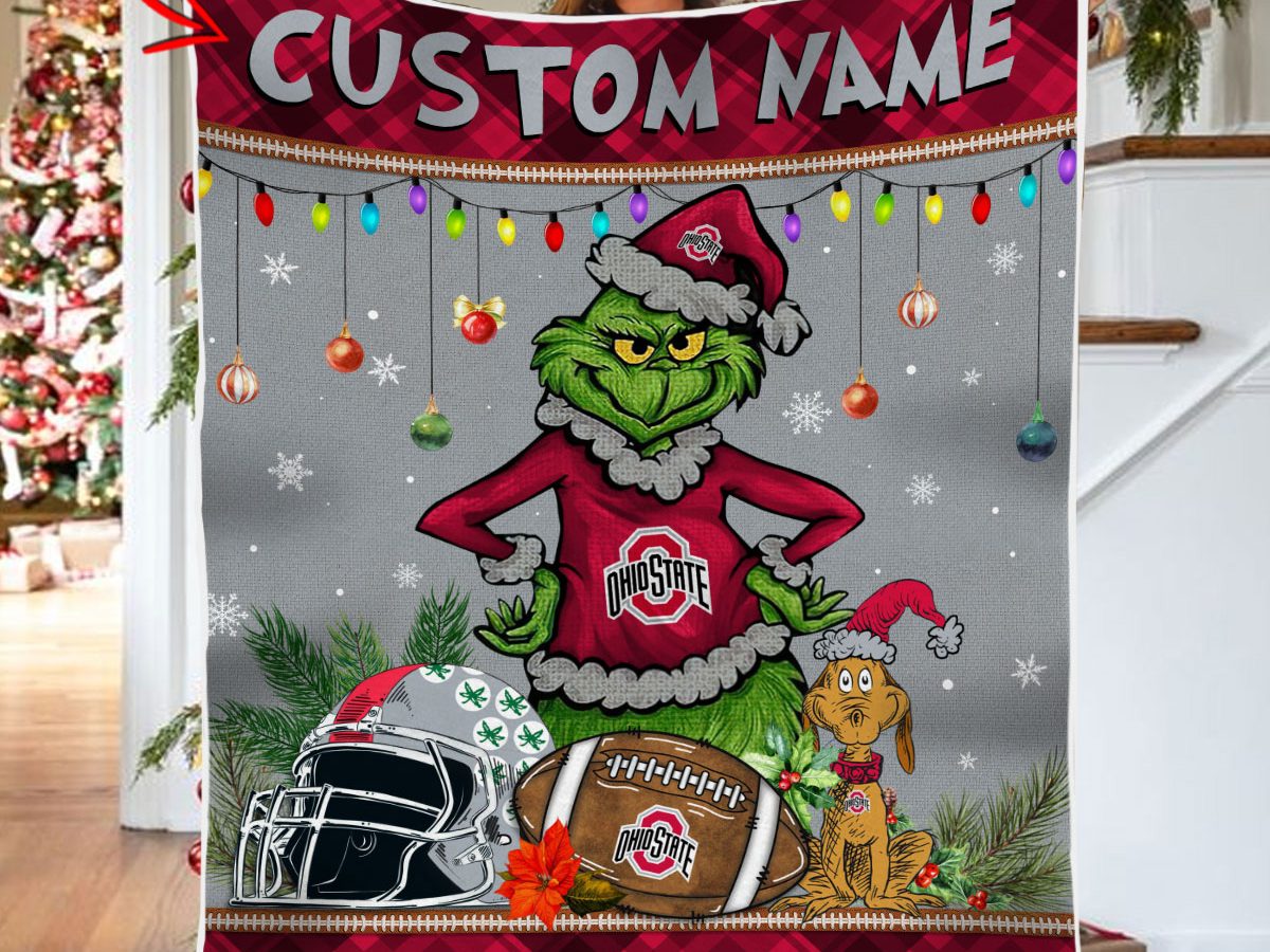 https://growkoc.com/wp-content/uploads/2023/11/Ohio-State-Buckeyes-Grinch-Football-Merry-Christmas-Light-Personalized-Fleece-Blanket-Quilt2B1-EnbgM-1200x900.jpg